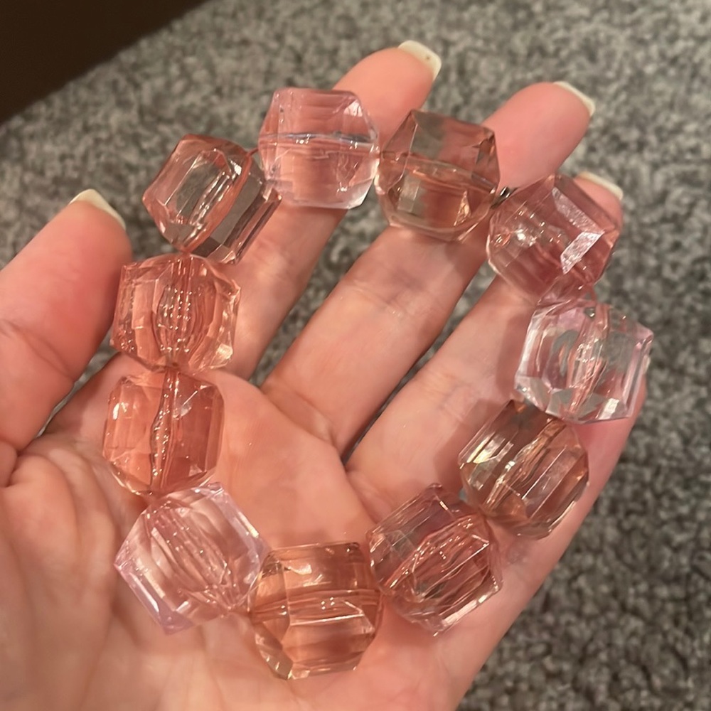 Tarina Tarantino large lucite bracelet. Cream soda/pink